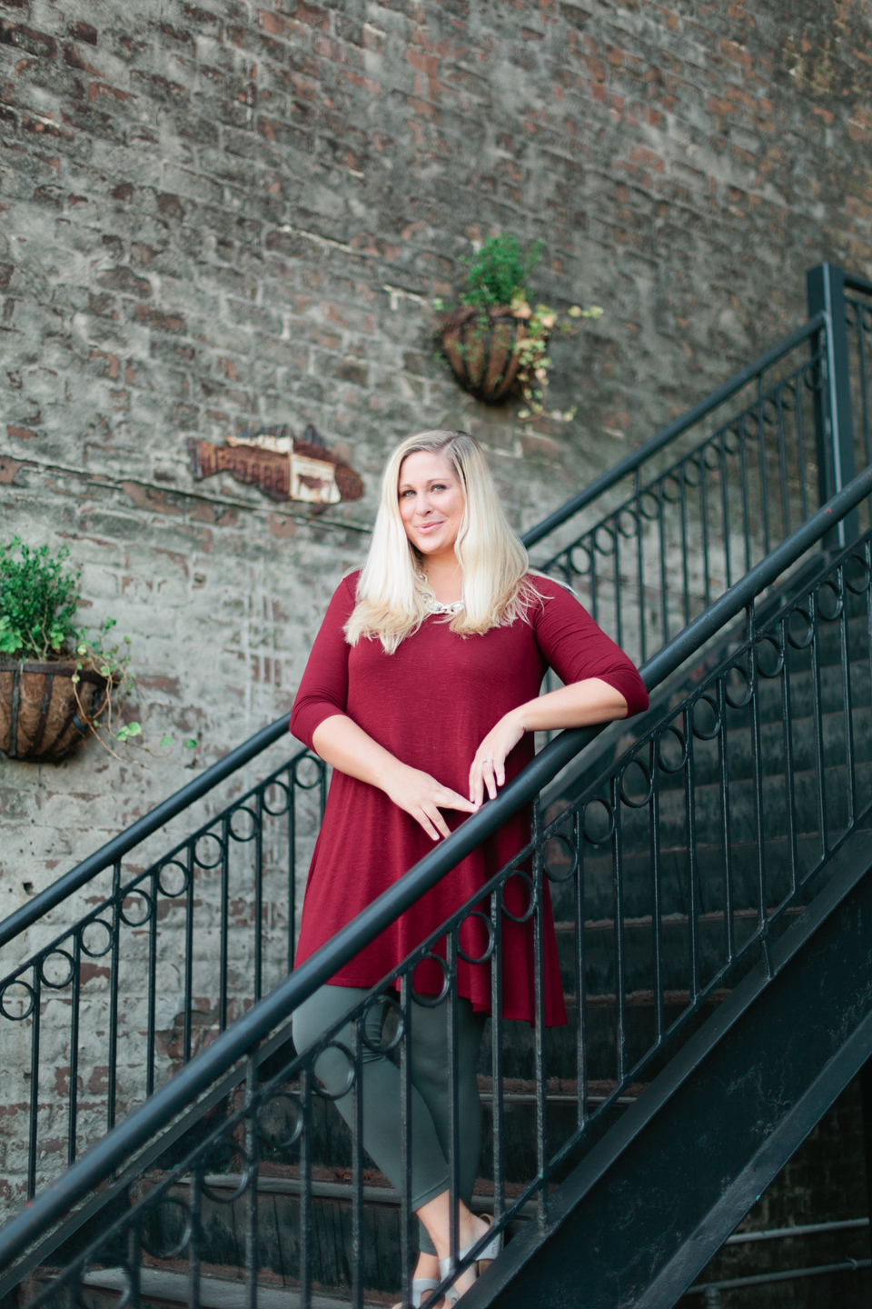 Image of a female photographer in downtown historic Savannah, Georgia.  This is Debra Eby of Debra Eby Photography.