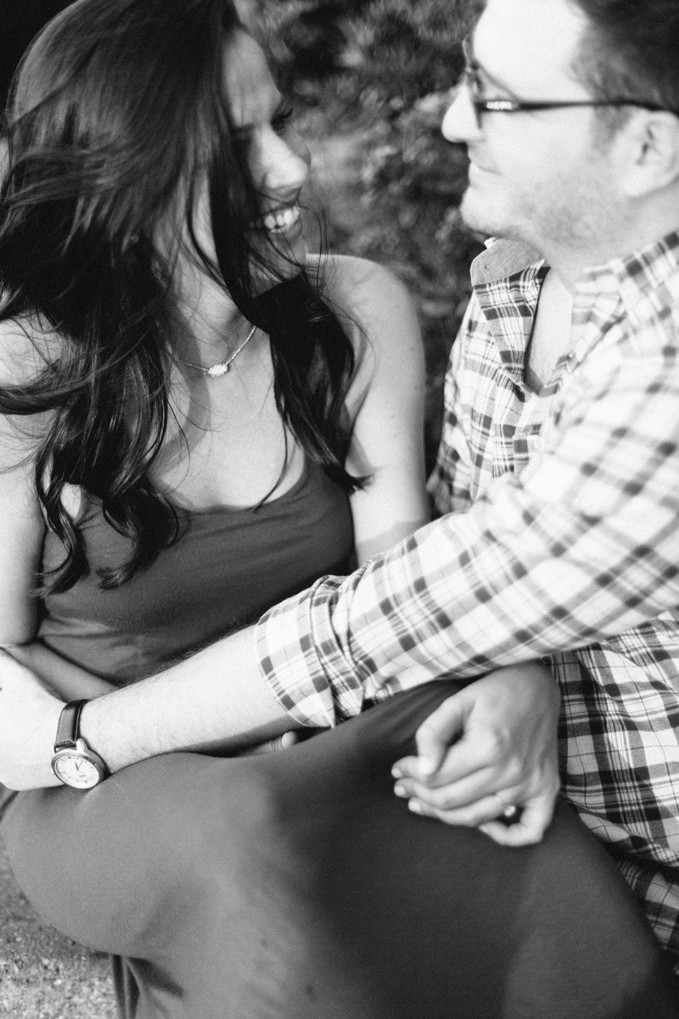 A black and white image of an engaged couple in downtown Orlando, Florida.