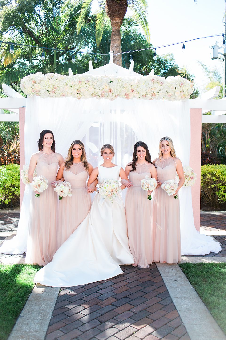 Bride with her bridesmaids on her wedding day at The Vinoy in St. Pete, Florida | Debra Eby Photography Co.