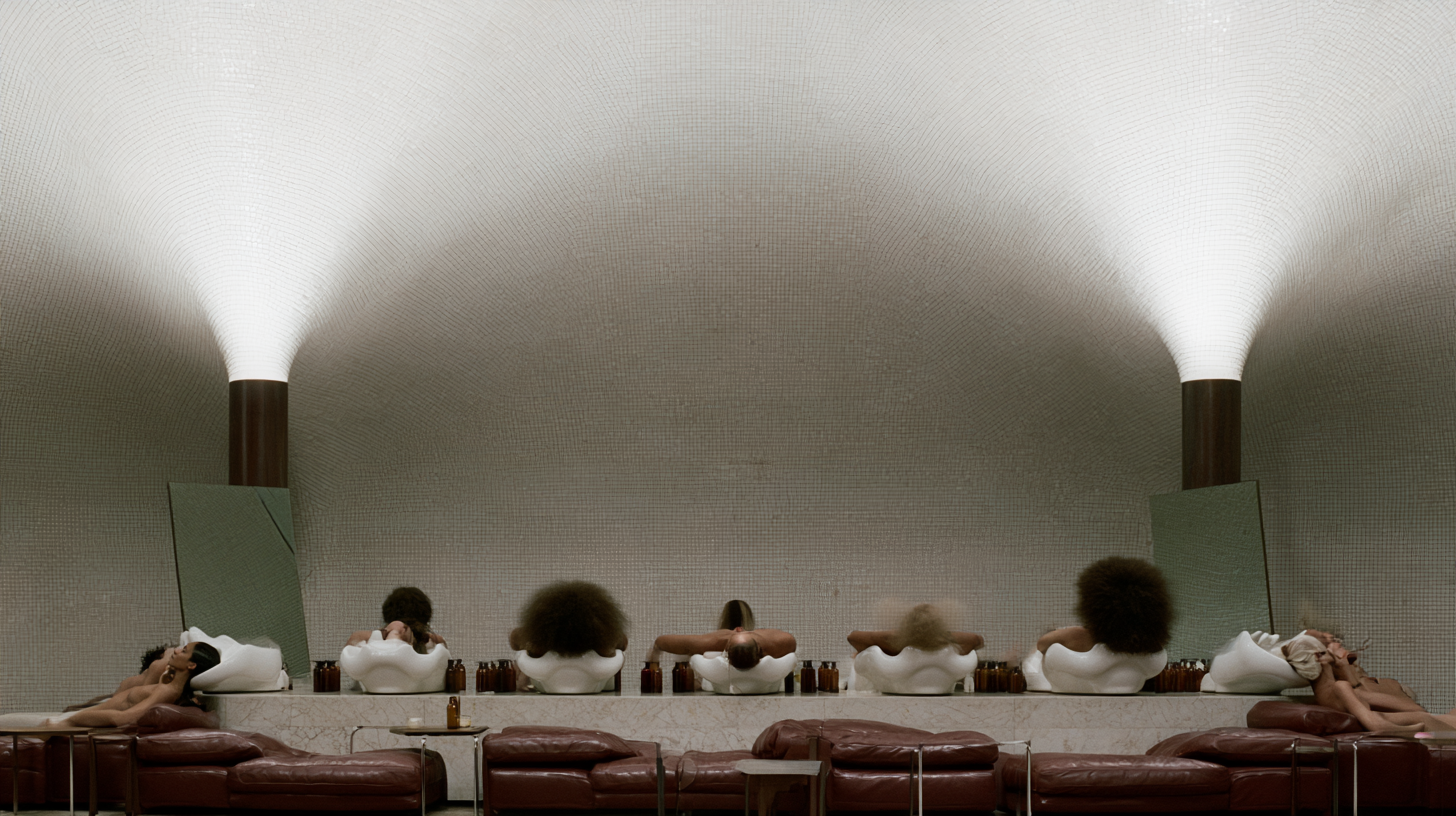 Levi_Lewis_LOL_shampoo_lounge_beneath_a_luminous_pale_off-whi_b942fe72-8fc7-41f1-8261-8a214e69863e_0.png