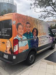 SCI-TECH DISCOVERY CENTERVEHICLE WRAP DESIGN