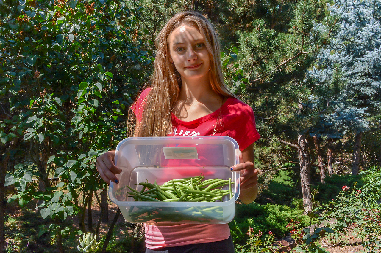 Kayla with green beans