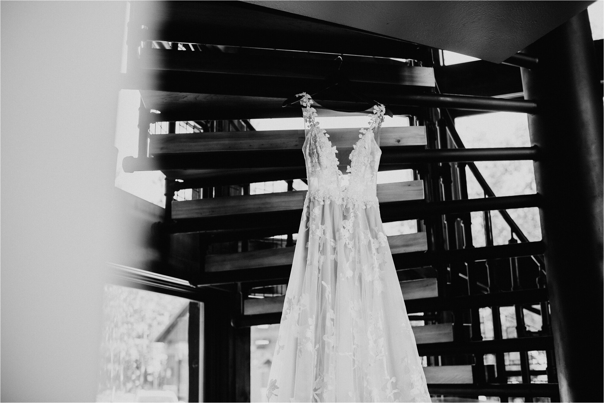  dress hanging from stairs wedding photographer 