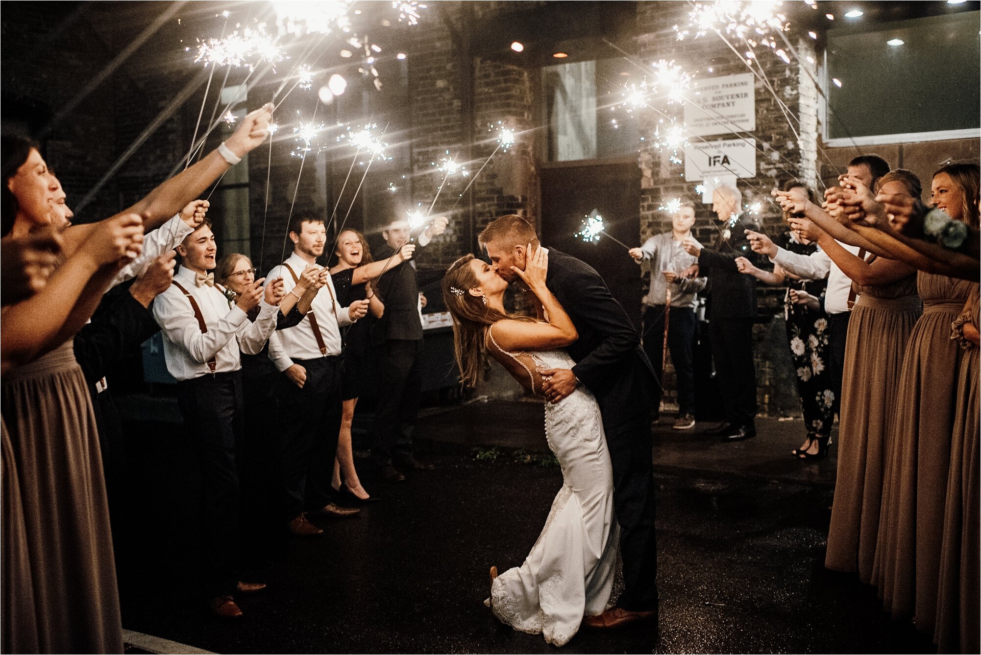  sparkler exit wedding couple bride and groom nighttime kissing farewell happy love 
