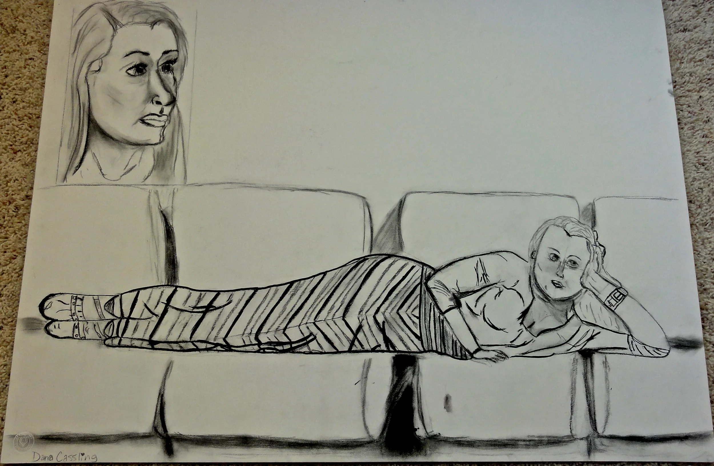  A portrait and full length drawing using charcoal and ink. 