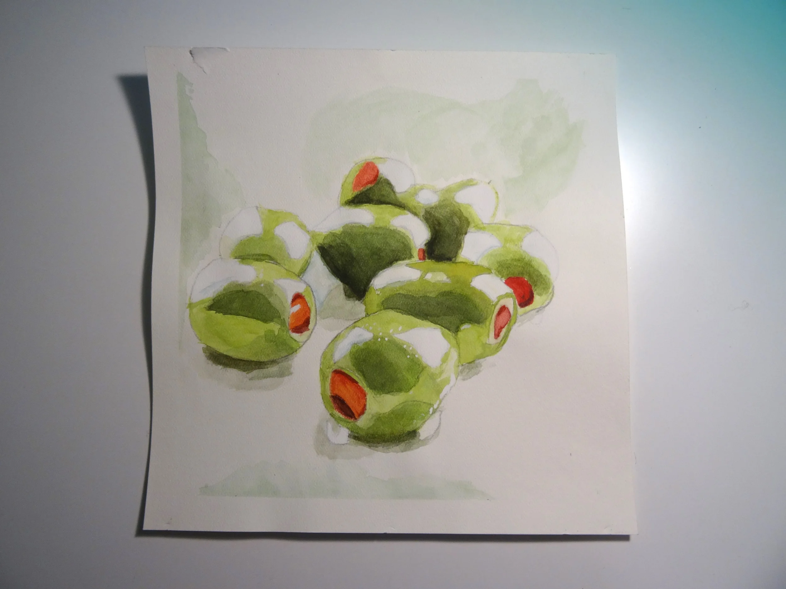  An arrangement of olives done using water color and guoche 