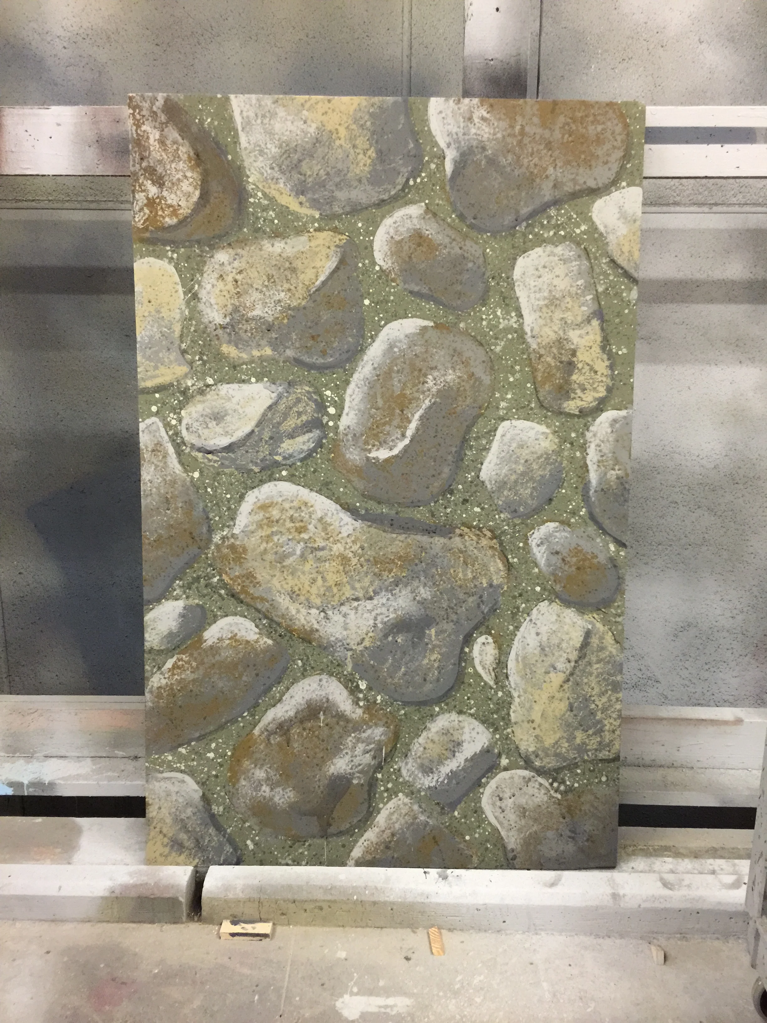  a scene painting project replicating rough stones on a 3.5x5' flat 