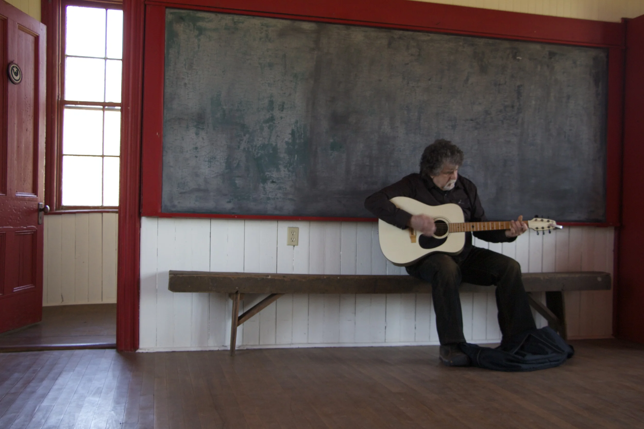 My uncle Pierre (who came from BC to help us set up and to be there for the opening) tested out the acoustics in the schoolhouse.