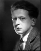 A half-shaded side profile of a young McPhee.