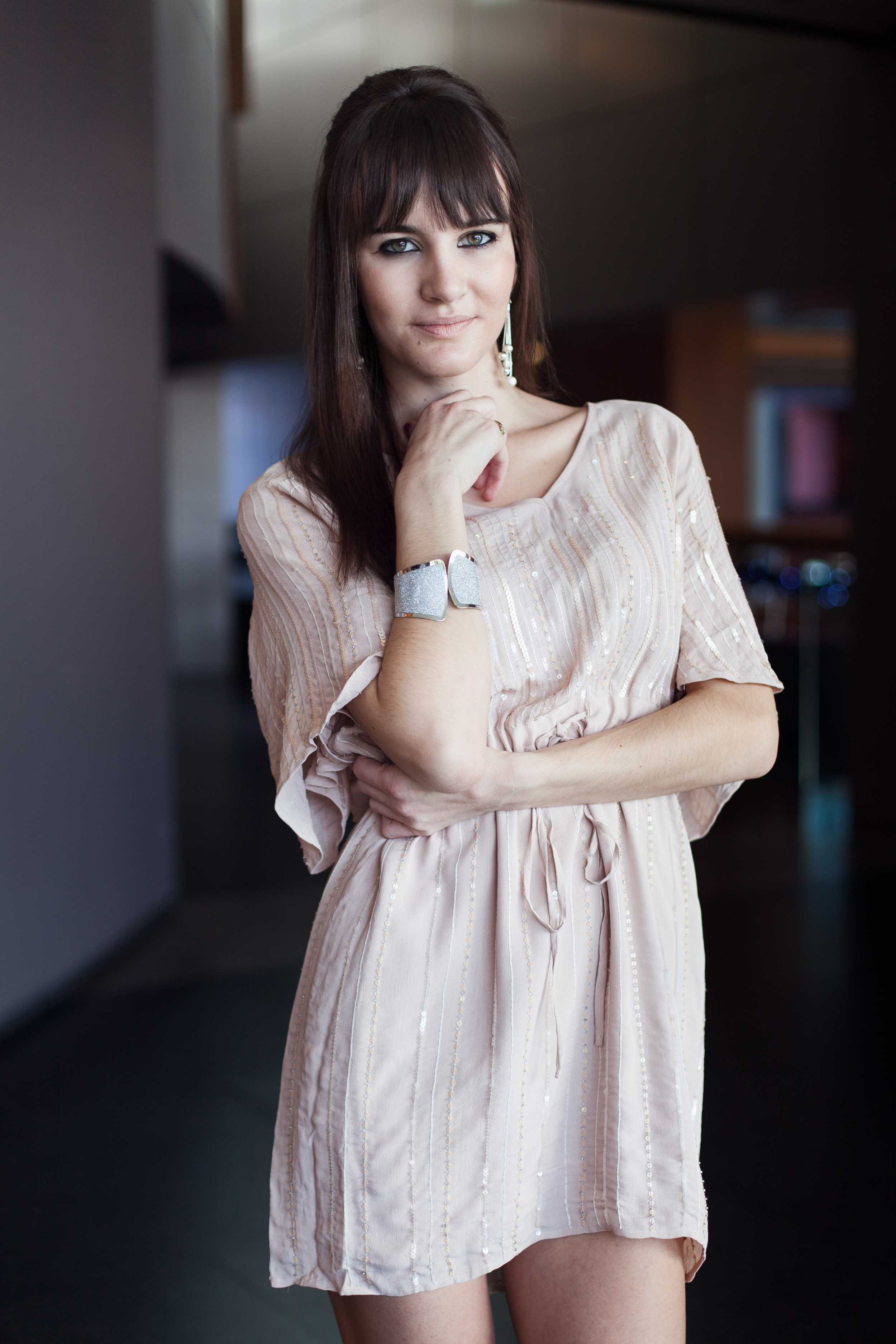 Model in peach colored dress - Kitchener