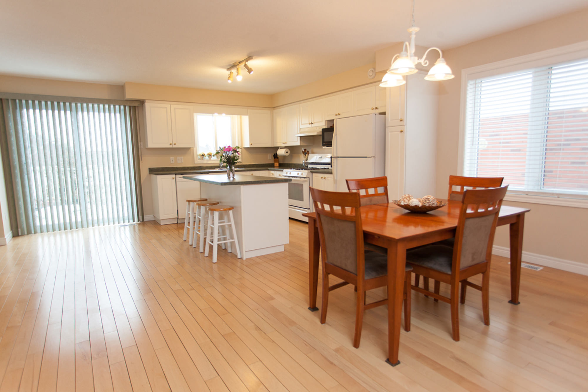 Hardwood floors in the dining and kitchen area.