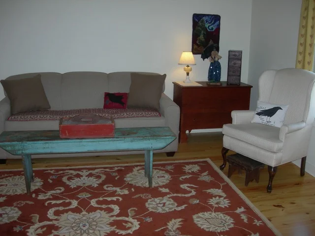The relaxing end of the room for entertaining.
