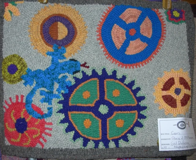 This Gears rug hooked by Gloria McPherson, a fellow Magdalena Rug Hooker, was there.... as well as many many other great rugs.