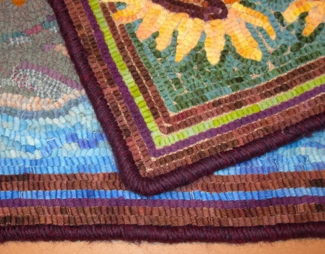 This photo shows that the front and back of the rug look identical. No binding tape is needed and the finished look is very neat and tidy.