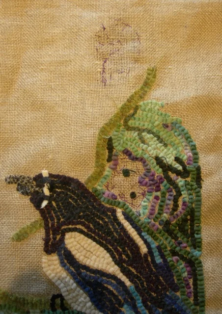 The back of the mat showing how the quillie clusters are sewn to the linen.