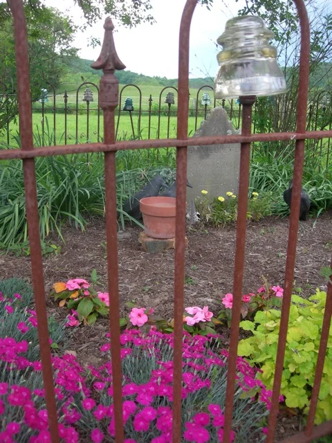 I planted some annuals in Daniel Peifer's cemetery. Then I burned white sage to honor the departed.