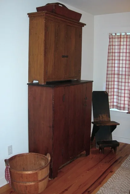 I admit that this double cupboard, which we created, is odd and mismatched, but it's practical for hubby's clothes. 