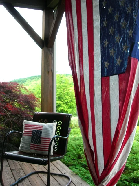 This very large 50 star flag flies on the front porch.