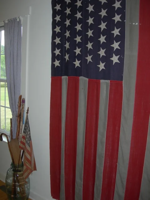 I bought this 45 star flag at a flea market in the 1970s. It appears to be made from a lightweight linen. I love the not-quite-white stripes. The 45 star flag was flown from 1896 - 1908.