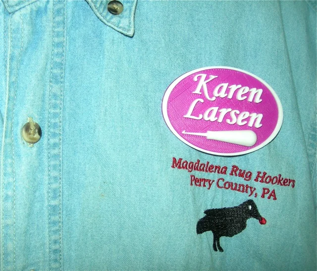....or wearing my Magdalena Rug Hookers shirt with my purple name tag. I'd love to see you there!