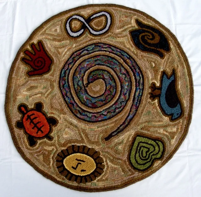 Down to Earth 2, designed and hooked by me, is winging its way to Oregon. This 36" diameter pattern is available on the Shop page, so you can hook one of your own.