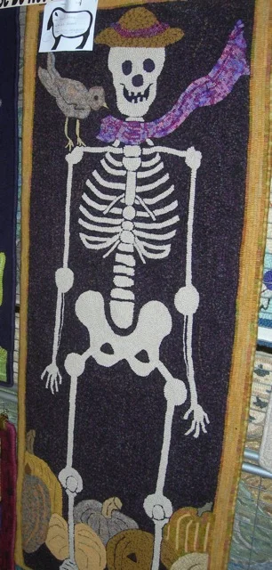 Mr. Bones designed by Ruth Hennessey and hooked by Jean Barr.