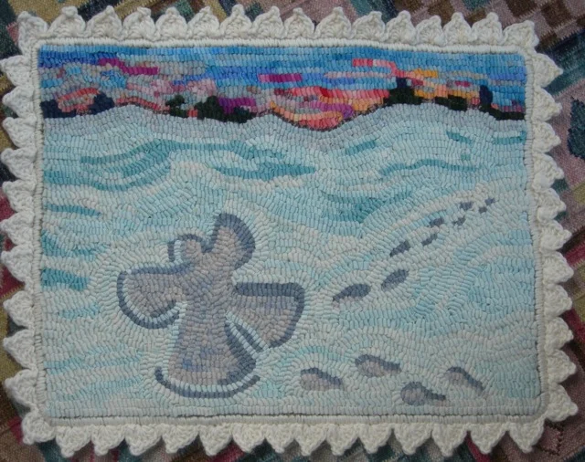 This is my Snow Angel rug that I also designed and hooked for the Magdalena Rug Hookers rug show in August.