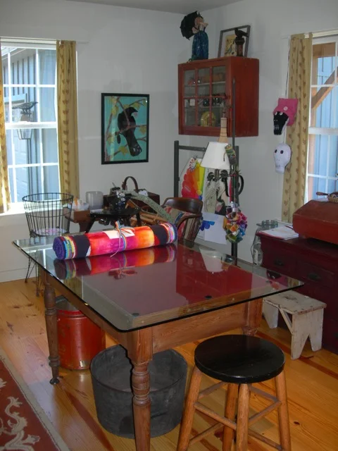 I've had this antique table for decades. It now is my cutting table with a large piece of tempered glass on the top.