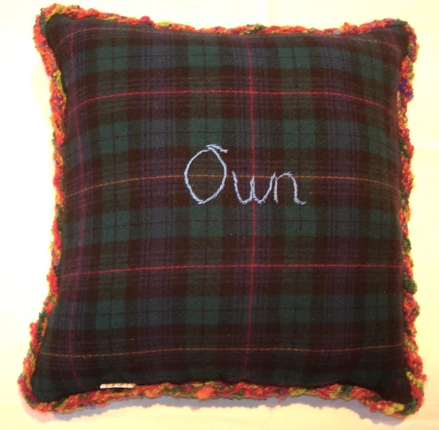 The back of my pillow with my key word in embroidery.