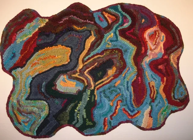 Oil and Water, 22" x 28” wool cloth and sari silk on linen foundation. Designed and hooked by © Karen Larsen, Crow's Foot Farm Designs, LLC.