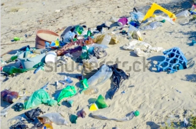 A Shutterstock image of beach litter. It makes me sad and mad to see this.