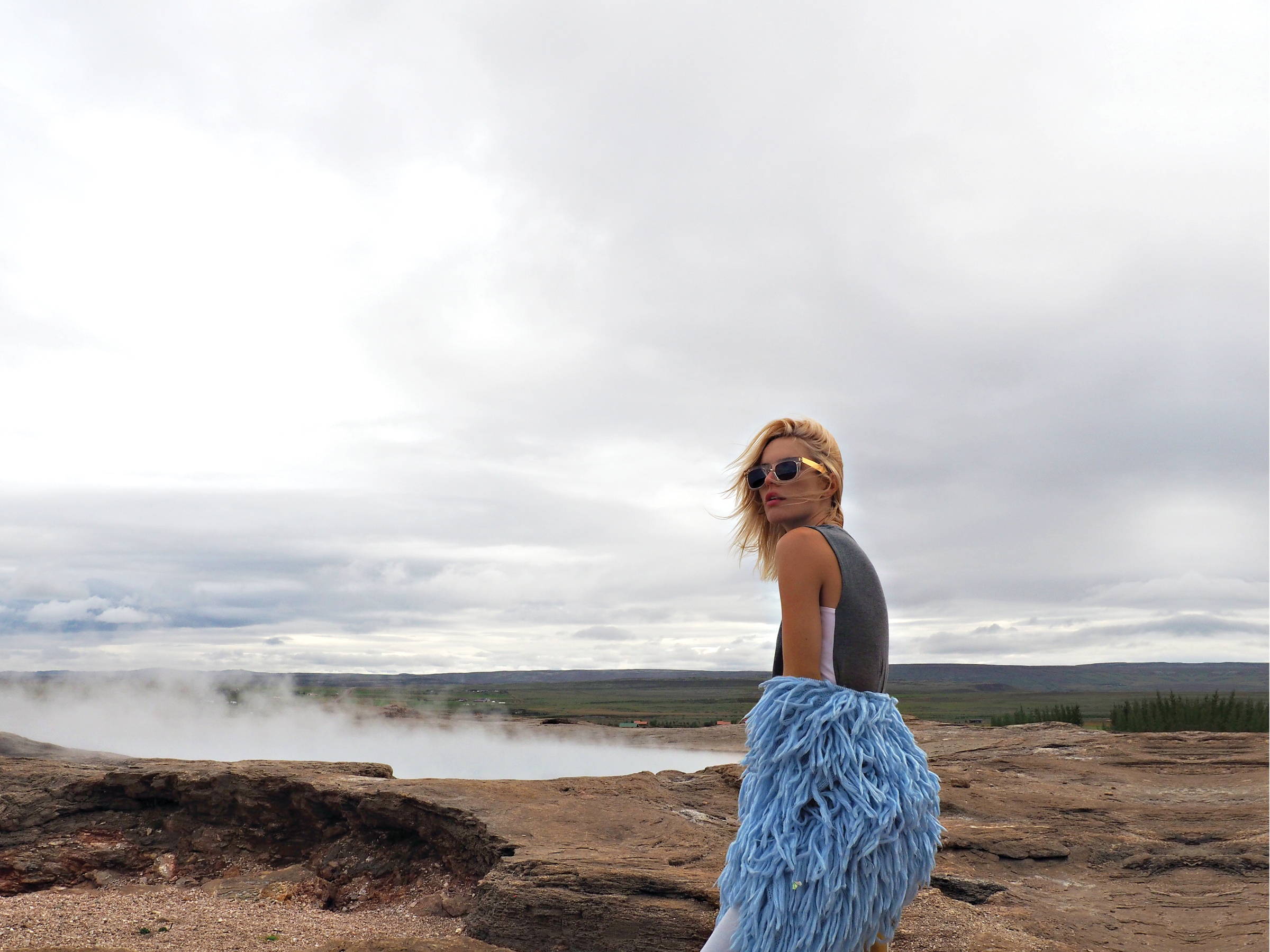 1PM GEYSIR HOT SPRING Chloe is wearing CICCIO FRANCIS CRYSTAL Sunglasses by RETROSUPERFUTURE, Sleeveless Top by Kit and Ace