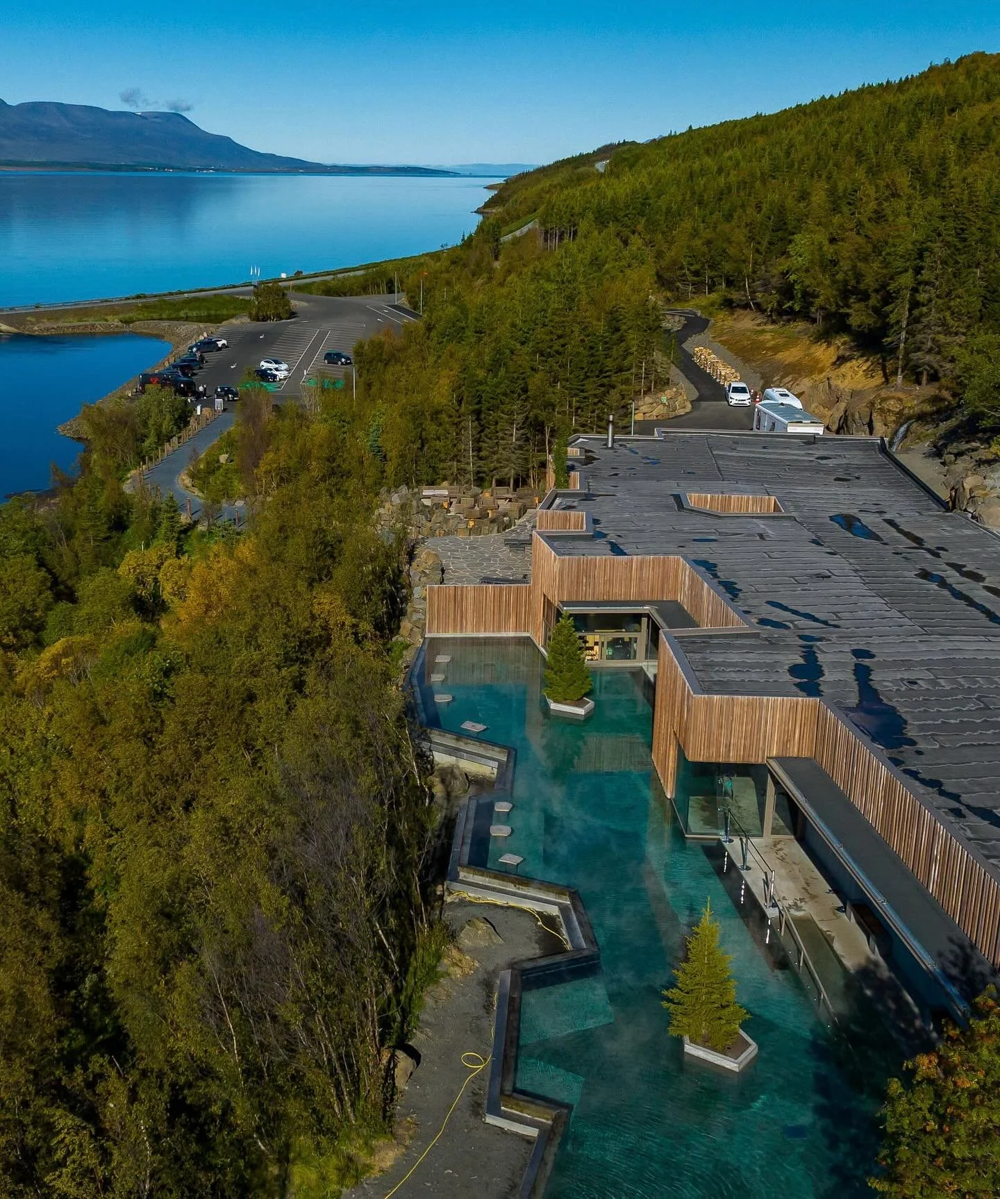 Built into the northern forest of Iceland, just minutes from Akureyri, Forest Lagoon breathes where birch, pine, and fir meet steaming water and volcanic rock. 

This geothermal spa was born of luck&mdash;a tunnel excavation through Va&eth;lahei&eth;