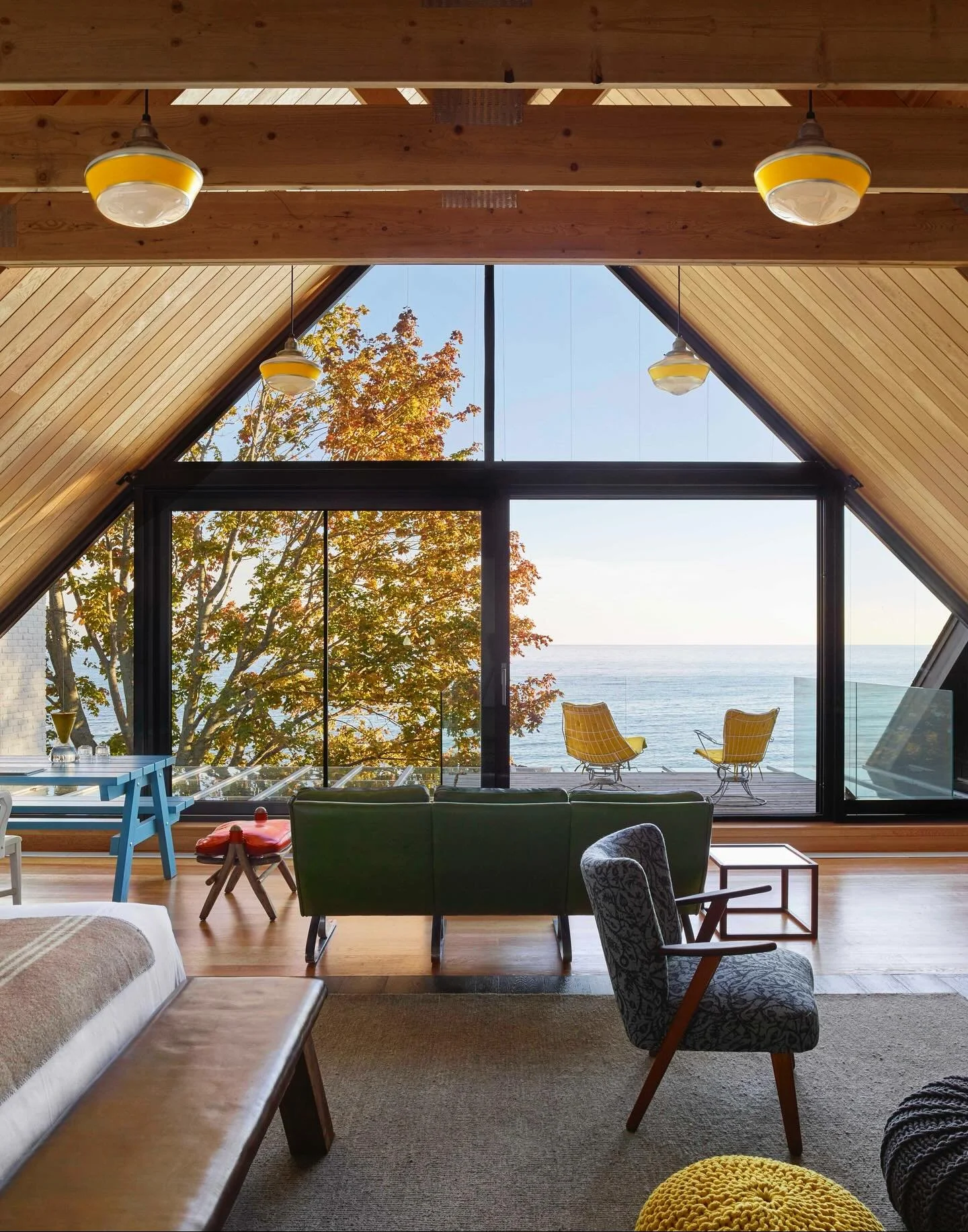 On the lakeshore in Wellington, the Drake Devonshire reimagines the old village inn as a playful, art-filled retreat. Part hotel, part cultural hub, it mixes rustic warmth with bold design&mdash;think barnboard beams, glass walls, and curated art at 