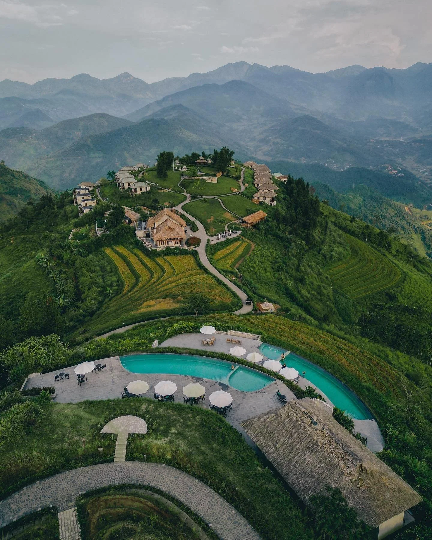 Perched high on a mountaintop in northern Vietnam, Topas Ecolodge feels like the edge of the world. The journey there winds through the rice-terraced valleys of Sapa, past waterfalls, bamboo forests, and villages where life moves at the rhythm of the