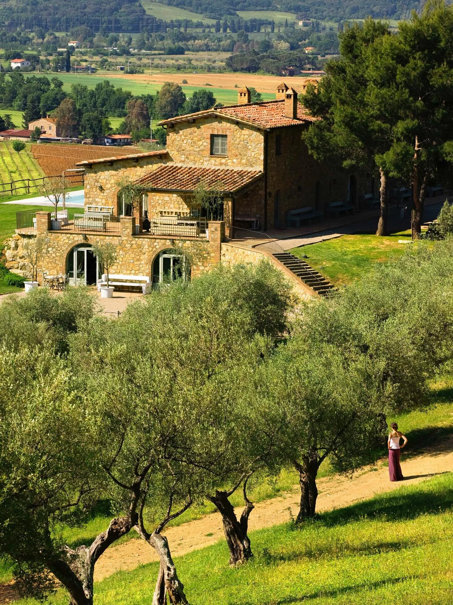 In the Tuscan Maremma, Conti di San Bonifacio is a hilltop wine estate where days are marked by the shifting colors of the sky over the vineyard. With only a handful of rooms, the stay feels intimate, almost like a private home&mdash;stone fireplaces