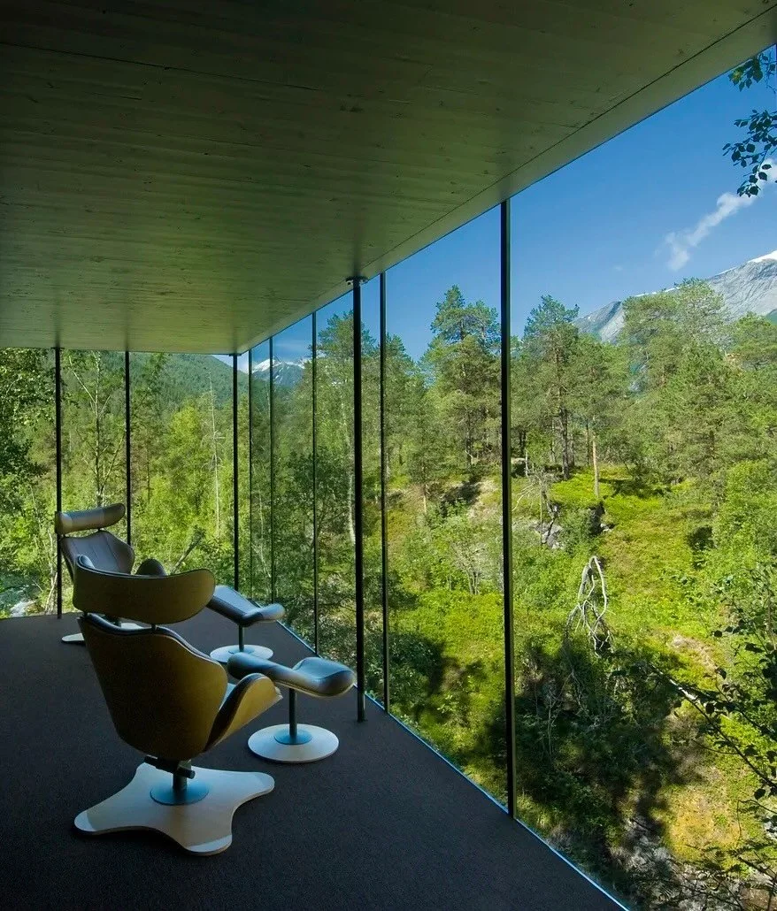 On Norway&rsquo;s remote northwest coast, Juvet Landscape Hotel sits quietly within a birch forest overlooking the Valld&oslash;la River. Designed by architects Jensen &amp; Skodvin, it&rsquo;s a study in restraint&mdash;seven glass-walled cabins sca