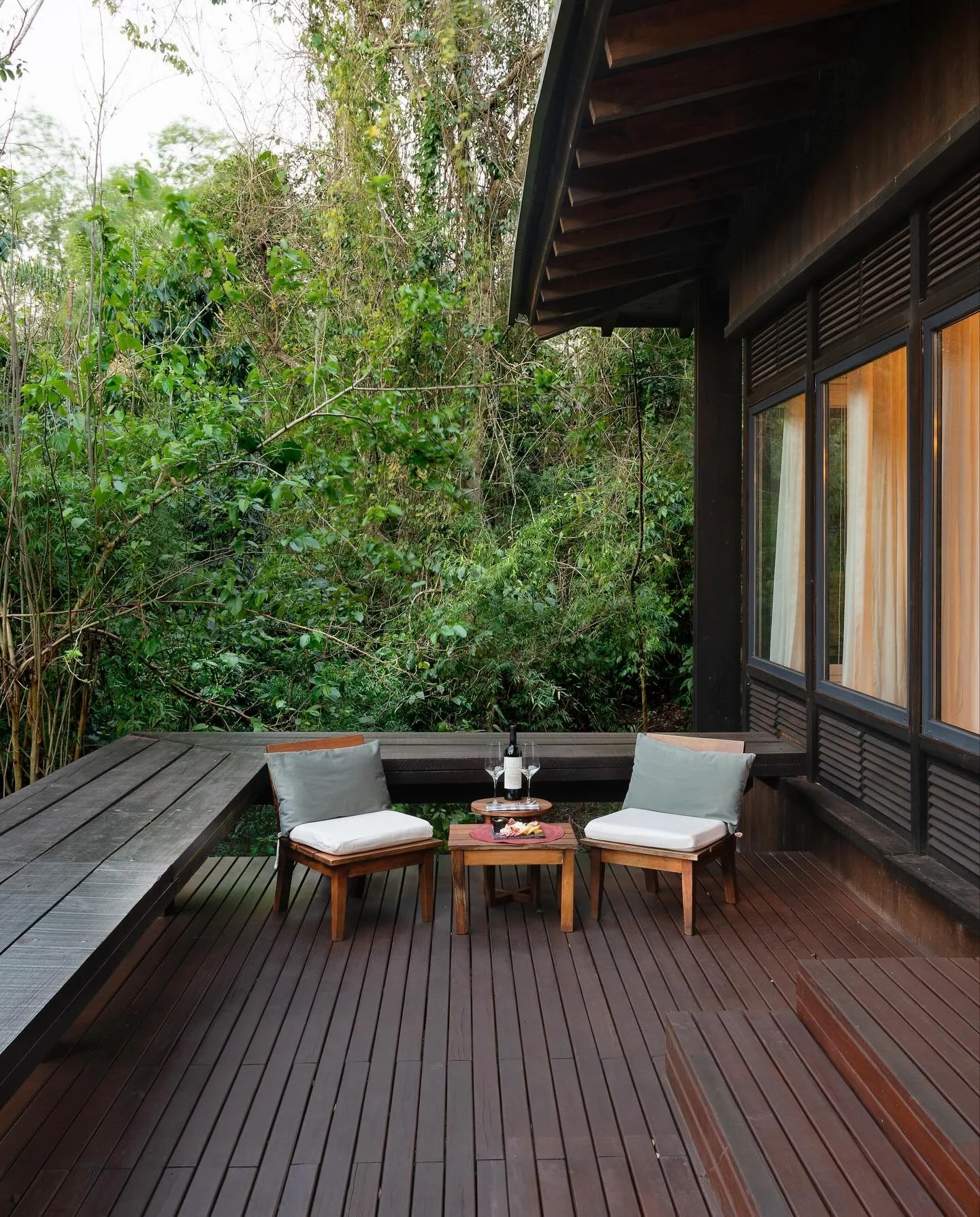 Awasi Iguaz&uacute; is hidden deep within Argentina&rsquo;s Atlantic rainforest, where the air hangs heavy with mist and the earth stays dark and alive beneath towering canopies. The architecture dissolves into foliage, built on stilts and timber wal