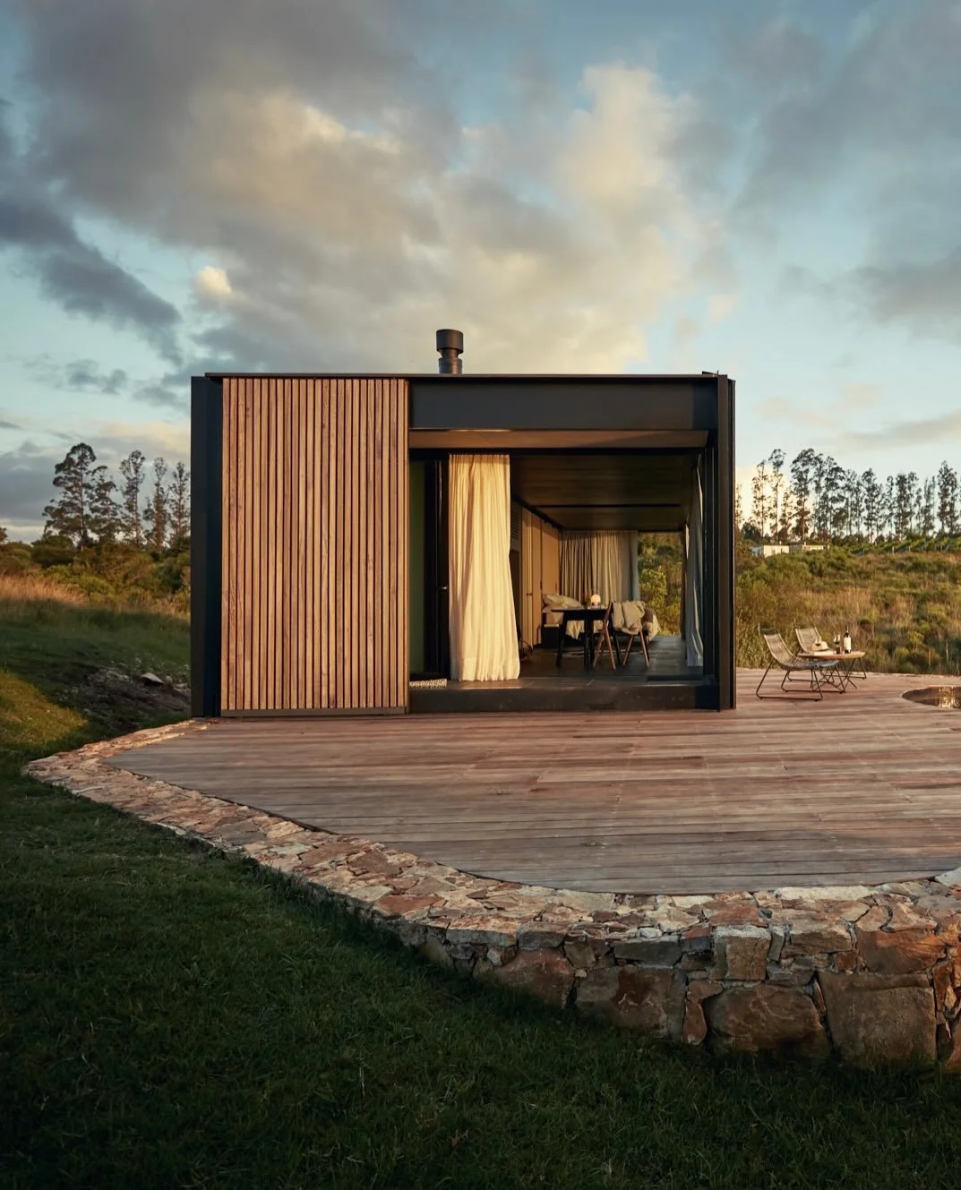Sacromonte is woven into the rolling Sierra de Carap&eacute; of Uruguay&rsquo;s Maldonado region, where ancient granite hills rise softly from a patchwork of vineyards and wild grasses. The architecture feels honest and grounded, built from warm ston