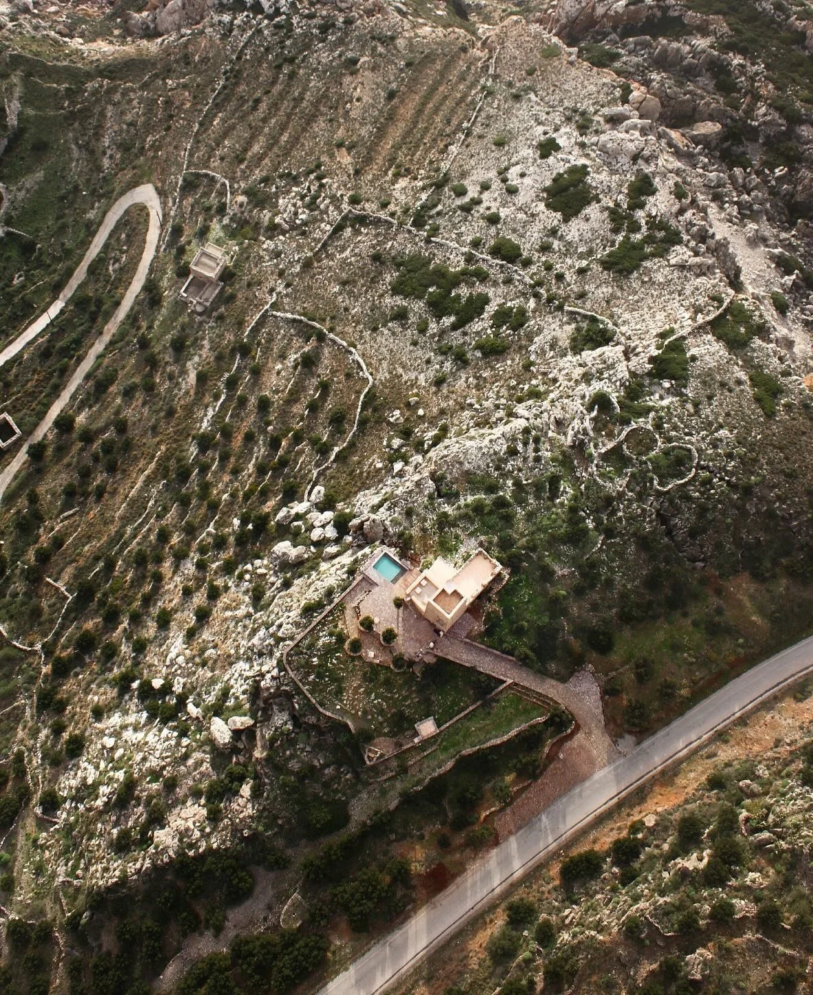 At the southern edge of mainland Greece, where the Mani Peninsula narrows toward the mythic point of Cape Tainaron, Tainaron Blue Retreat is shaped by stone, sea, and silence. The architecture draws directly from Maniot tower houses, built in local l