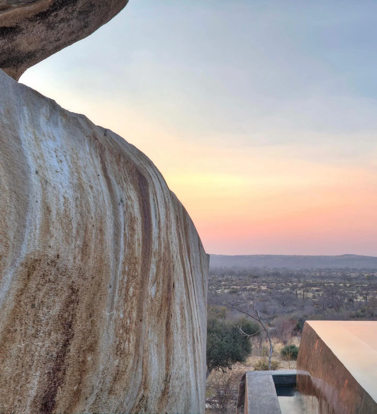 In the rugged heart of Ruaha National Park, Jabali Ridge offers a safari far removed from the classic plains. This is a landscape of rocky outcrops, ancient baobabs, and dramatic escarpments, where the Great Ruaha River draws large prides of lions, v