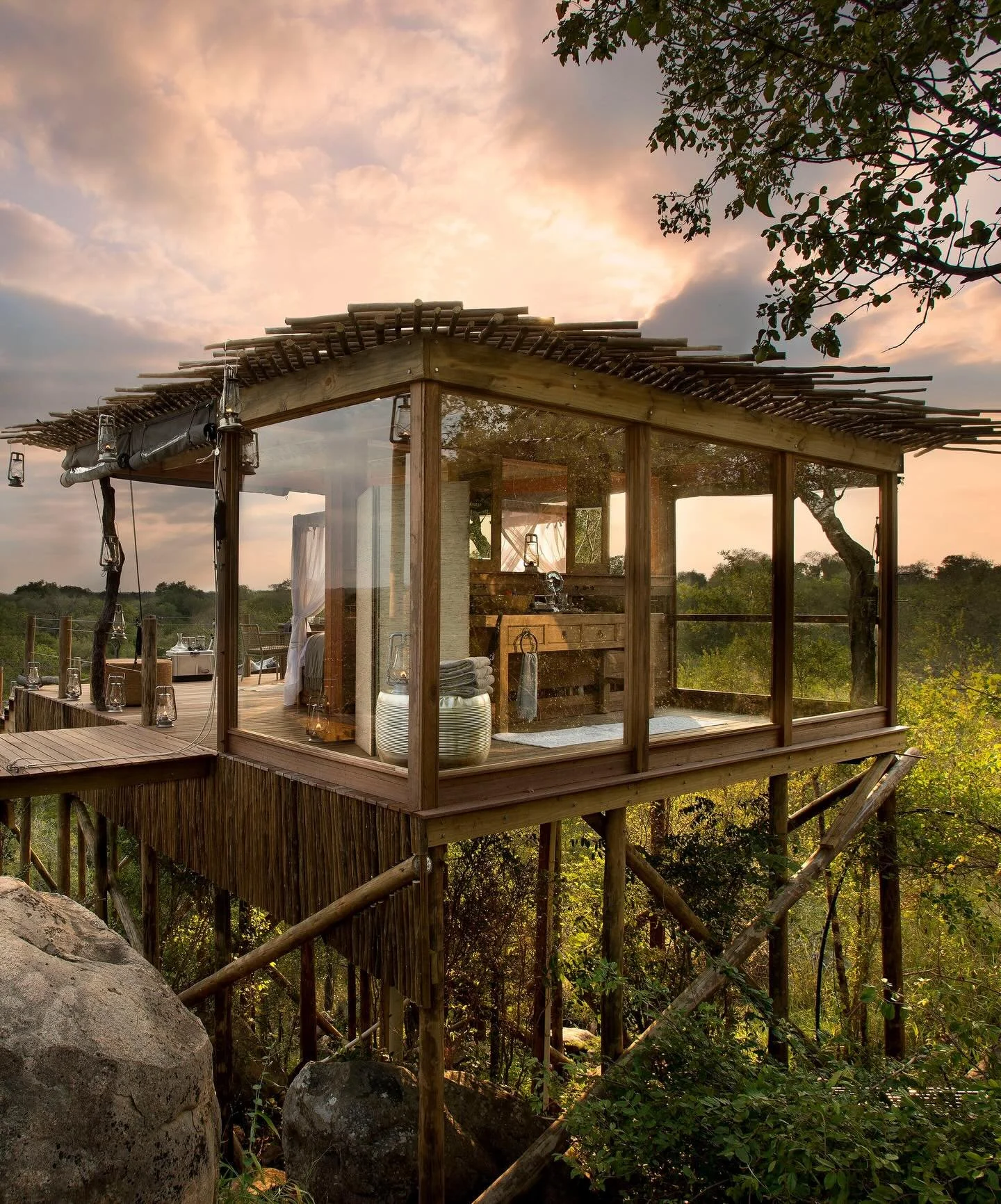 Set deep within the wilderness of Sabi Sand Game Reserve, the Treehouse Experience at Lion Sands Game Reserve invites guests to spend a night suspended between earth and sky. Reached by safari vehicle at sunset, the treehouses such as Chalkley, Kings