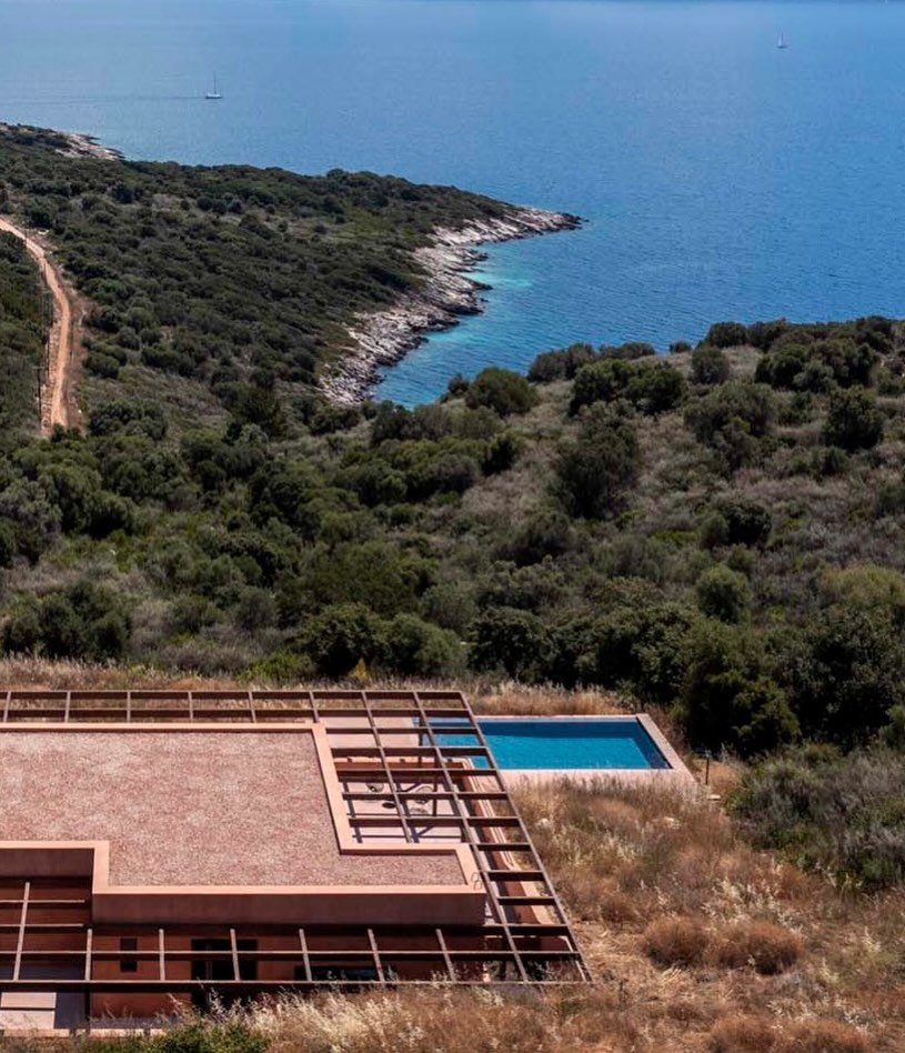 Gaia unfolds on the quiet island of Meganisi, where olive groves, sea air, and distant mountain ranges shape a slower, elemental rhythm. Set along a ridge overlooking the Ionian, the residence feels grounded in myth and material, drawing from the ide