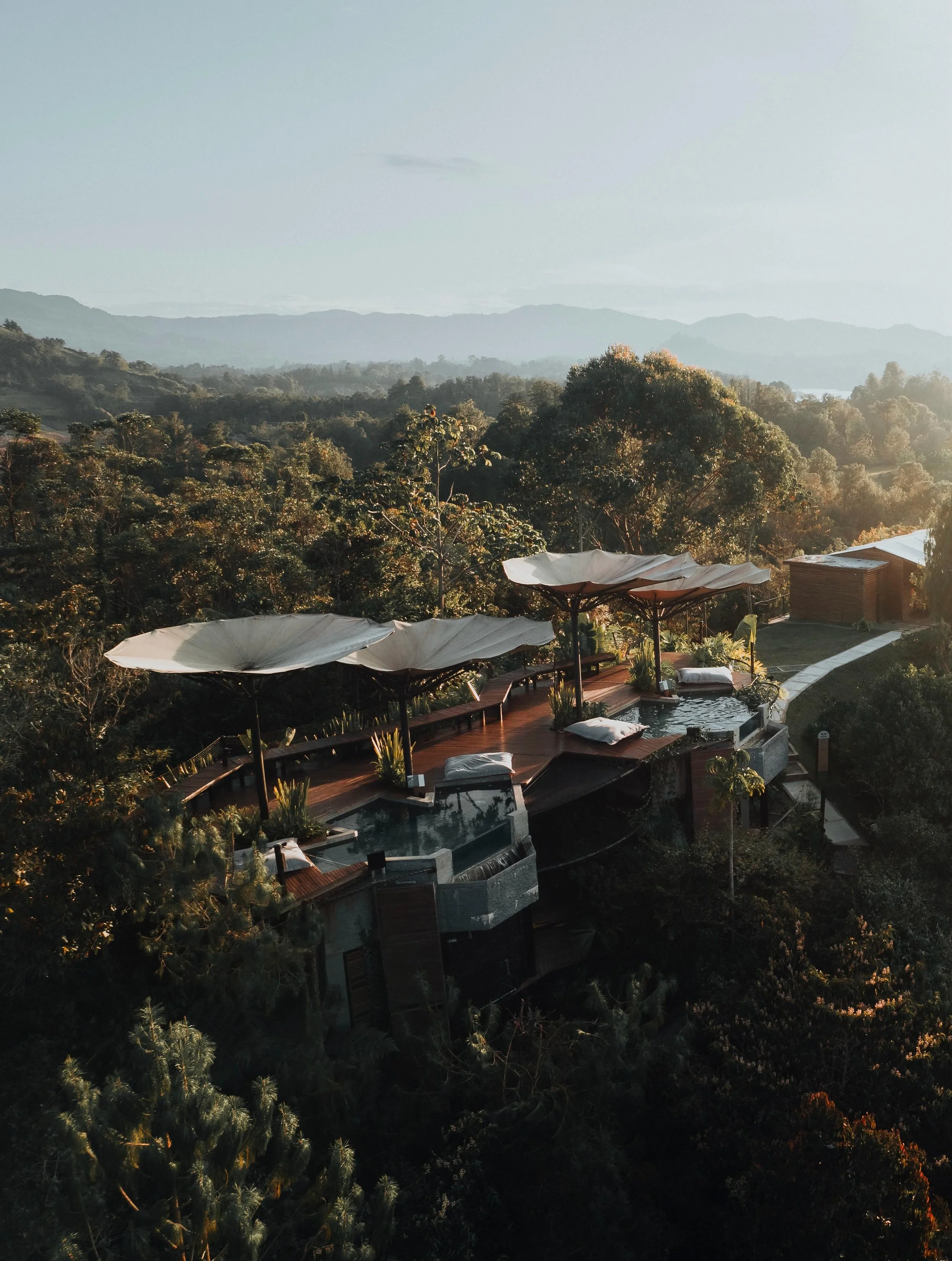 The region surrounding Guatap&eacute; is defined by dramatic granite formations, dense forest, and a network of lakes created by flooded valleys that transformed the geography into a shifting landscape of water and islands. Mist moves slowly across t