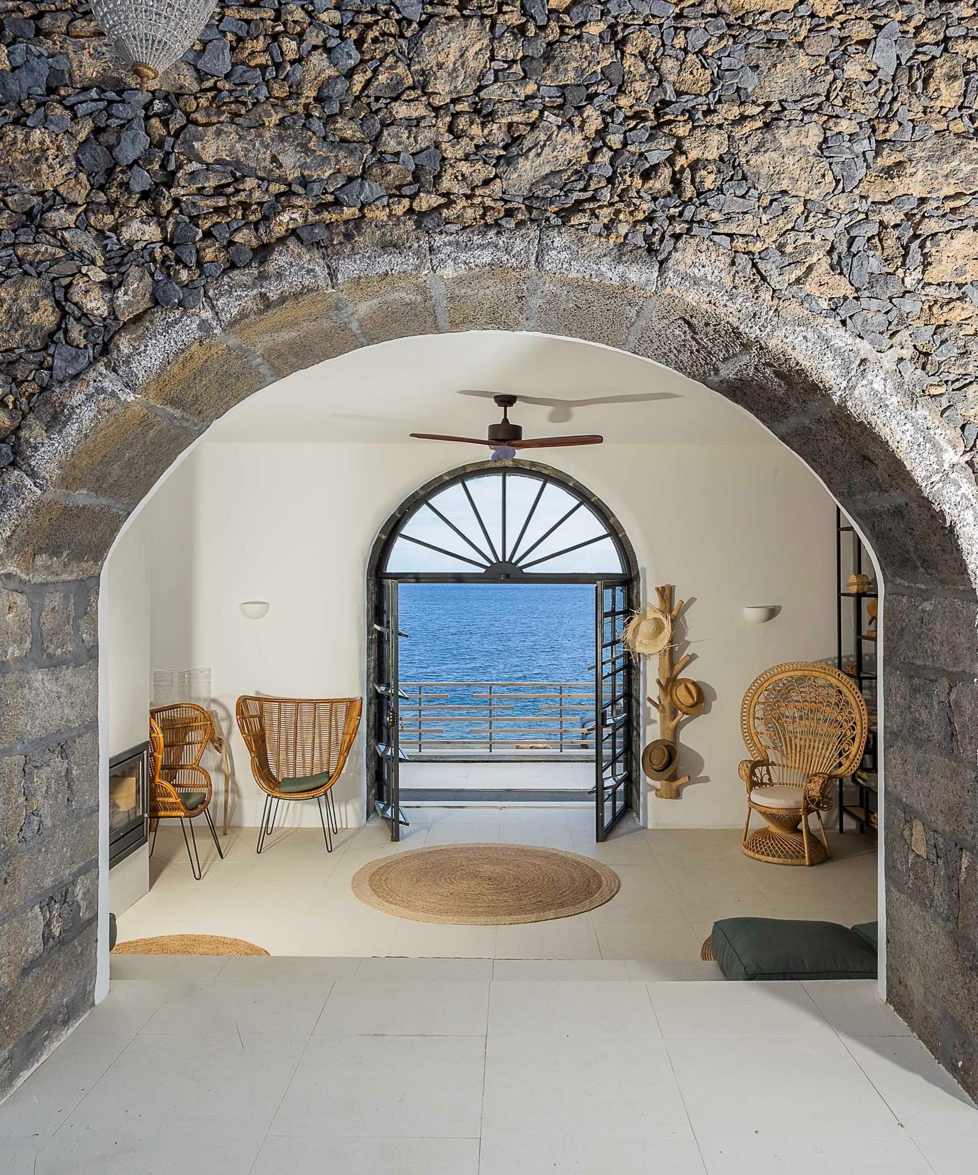 On the volcanic island of S&atilde;o Miguel, White Exclusive Suites &amp; Villas sits above the Atlantic within a landscape shaped by lava rock, geothermal activity, dense greenery, and rapidly shifting ocean weather. The Azores feel unlike mainland 