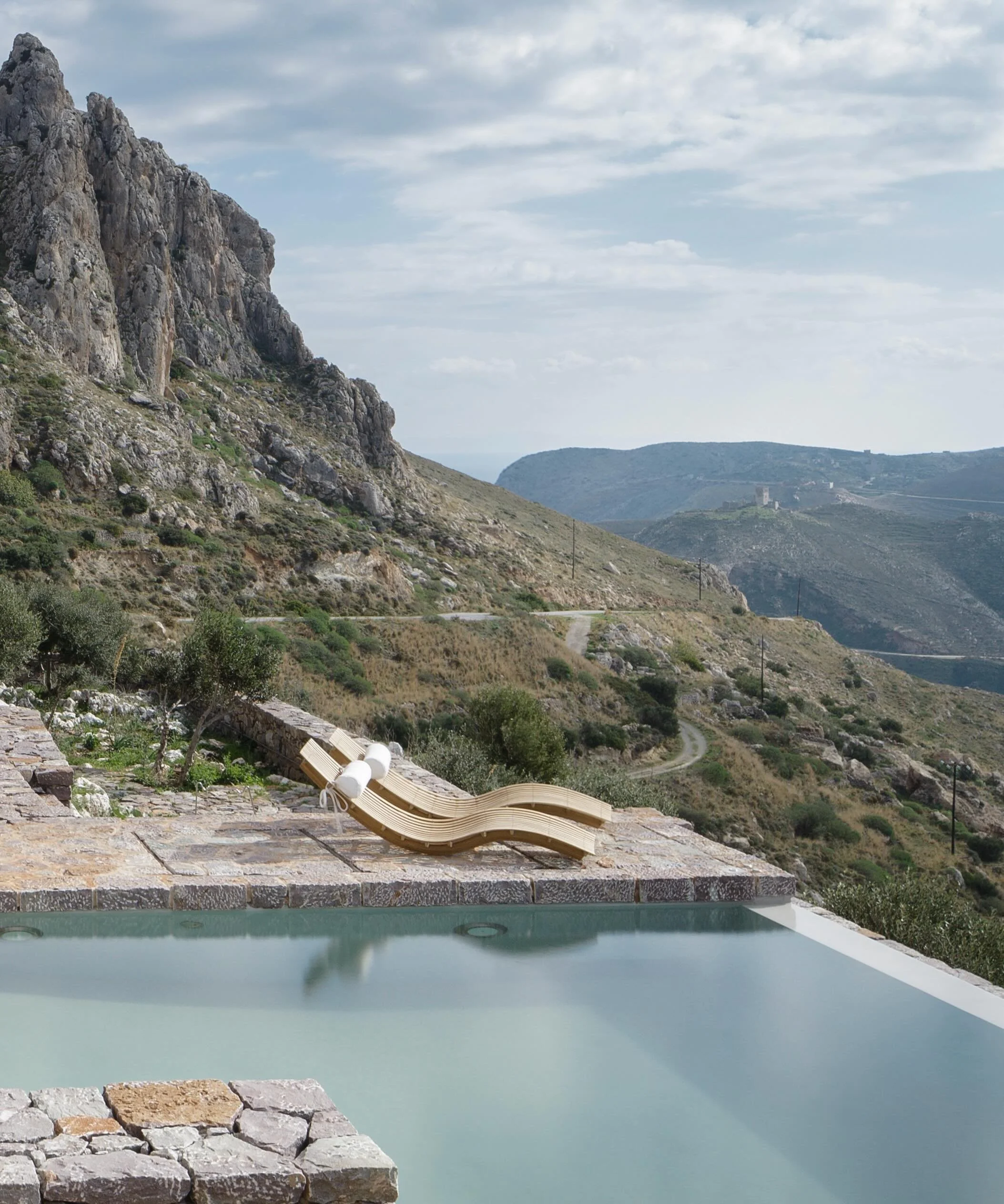 Set high above the coastline of the Mani Peninsula, Tainaron Blue Retreat occupies one of the southernmost points of mainland Europe, where mountains collapse dramatically into the deep blue of the Mediterranean. 

The geography feels raw and element