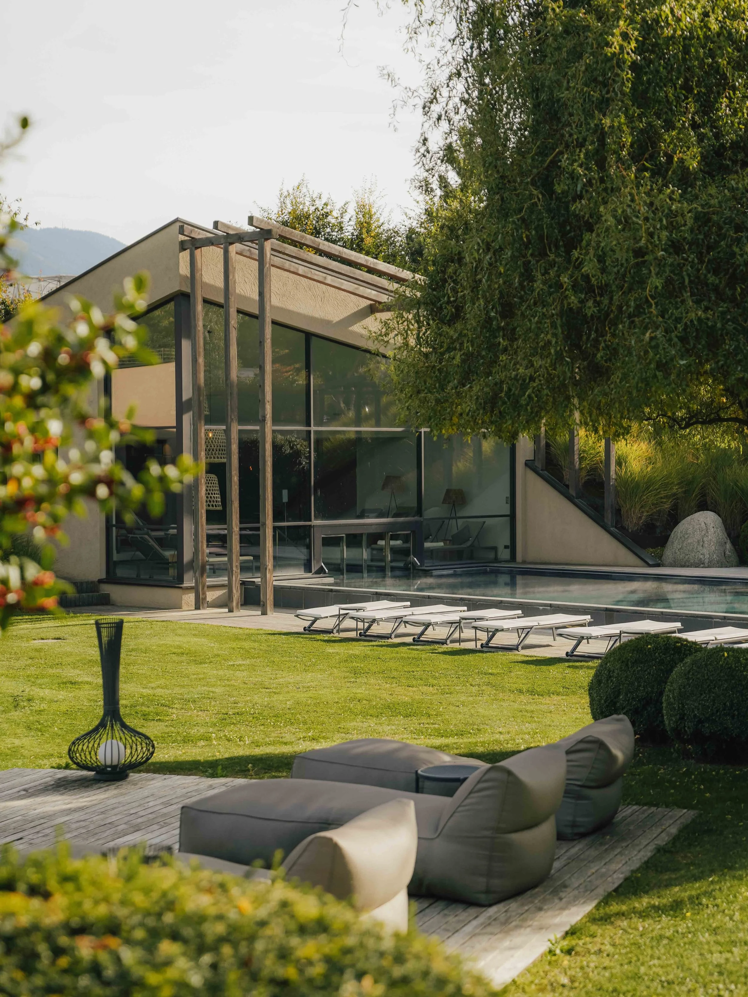 Seehof Nature Retreat sits in Naz-Sciaves near Brixen in South Tyrol, where alpine meadows, apple orchards, and spruce forests unfold across the Isarco Valley, framed by the distant peaks of the Dolomites. Summer here is defined by long, luminous day