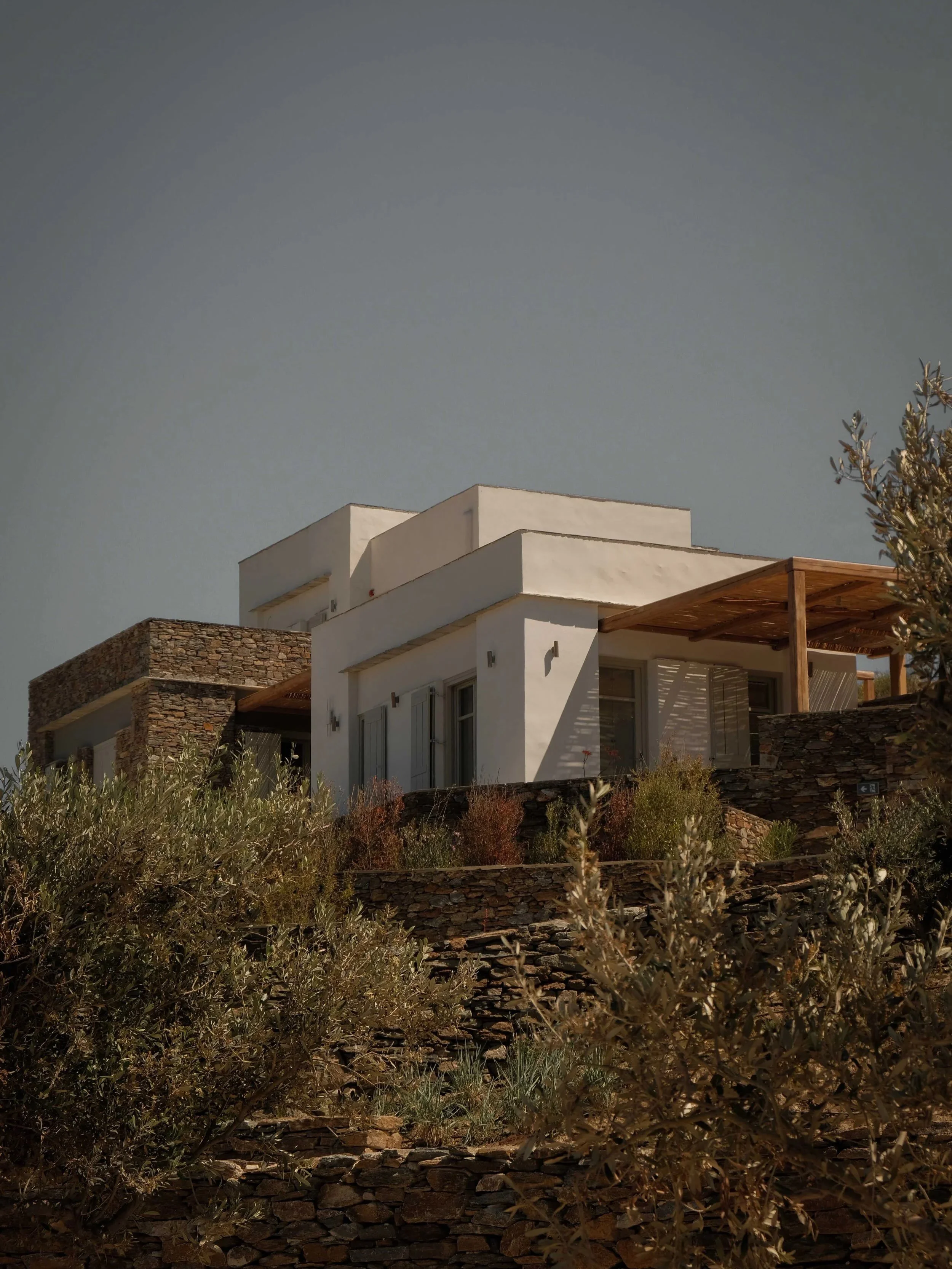 Perched above the sapphire waters of the Aegean in Sifnos, Stamna is rooted in the rich agricultural and ceramic heritage of an island famous across Greece for its historic culinary traditions.

The on-site kitchen at Pilōs Restaurant embraces an aut