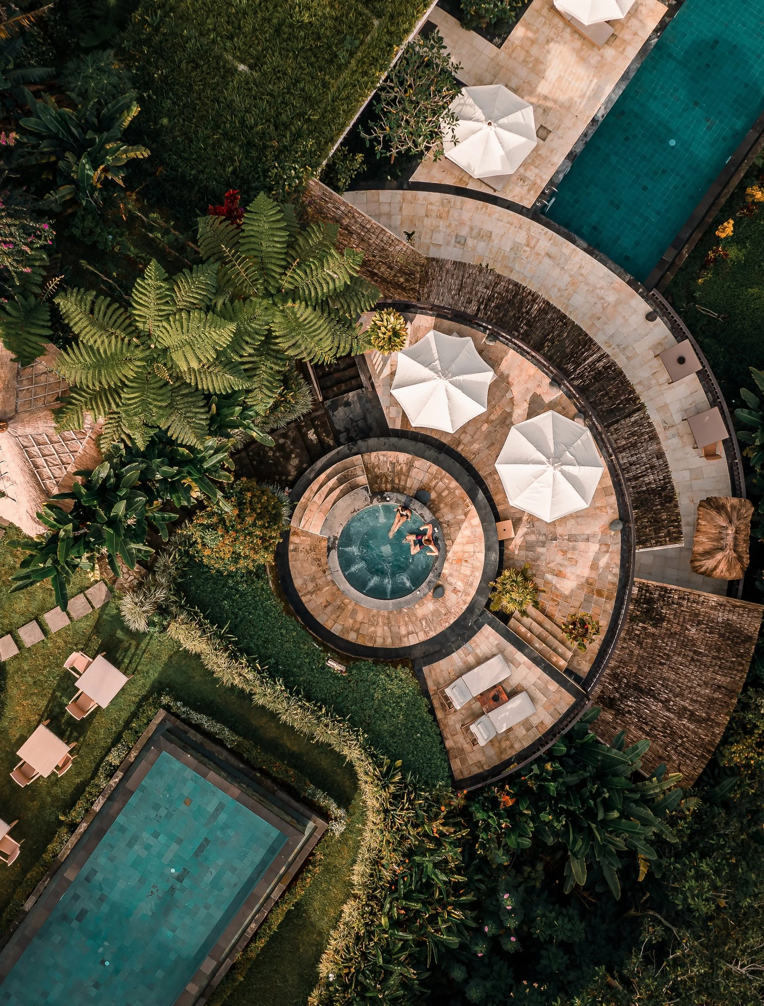 Elevated high in the mist-shrouded highlands of North Bali, Munduk Moding Plantation translates traditional Balinese cosmology into architectural form through the ancient principles of sacred spatial orientation. Designed by architects Popo Danes and