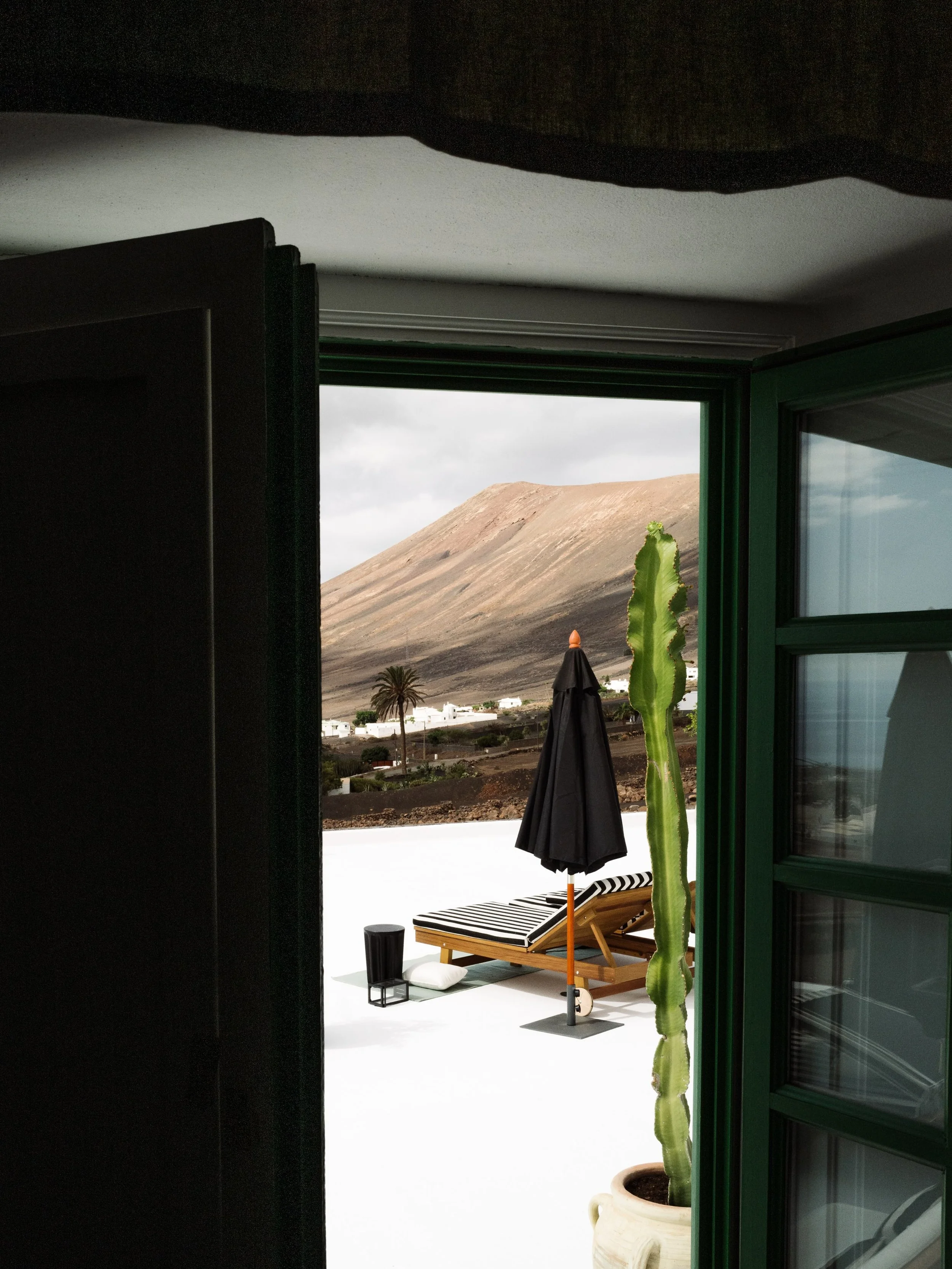 Grounded in the raw, volcanic terrain of Lanzarote, Hotel C&eacute;sar Lanzarote pays homage to the legendary Canary Islands artist, architect, and environmental activist C&eacute;sar Manrique. 

Set in La Asomada amid black volcanic earth and wide-o